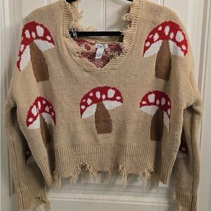 Bundle of four sweaters. Please see description for details